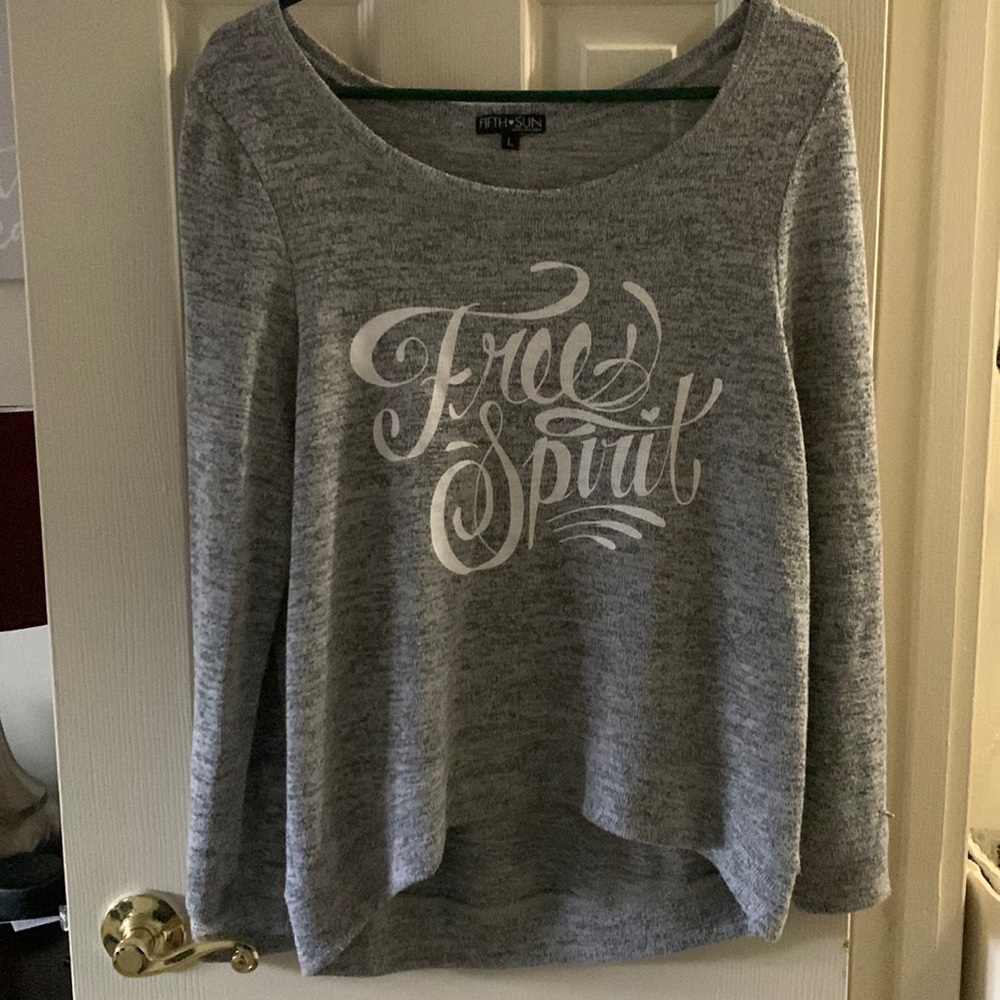 Gray long sleeve shirt that is very comfortable and is a size Large.